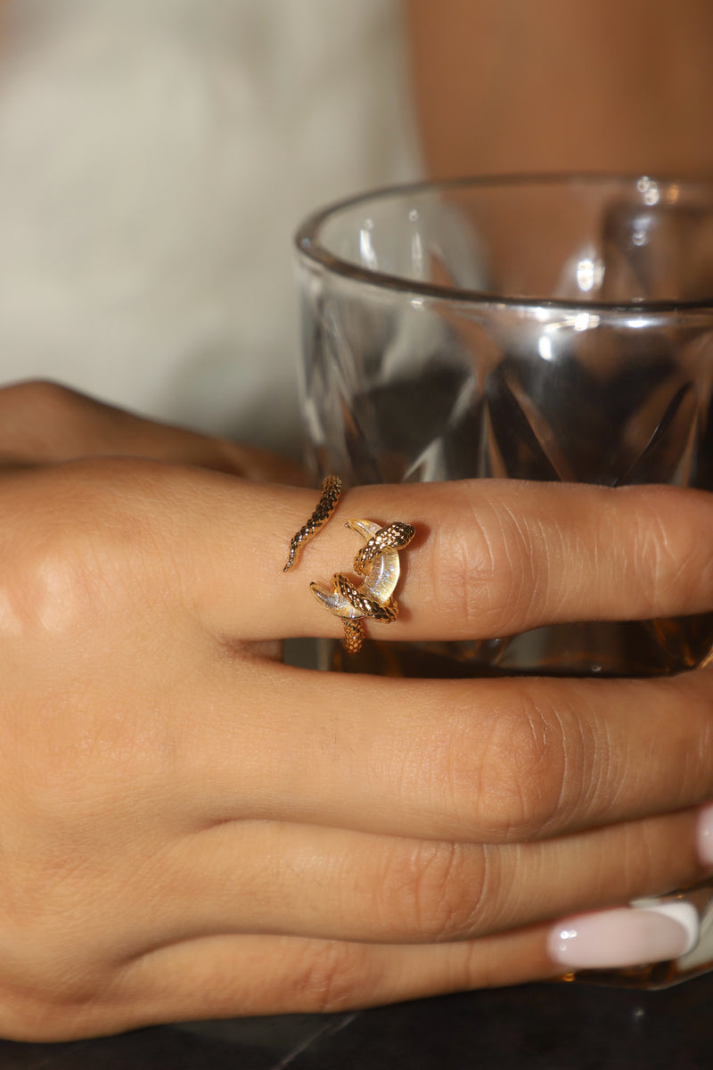 20K gold-plated adjustable snake wrap ring with a moonstone moon