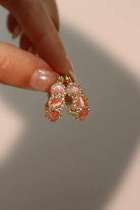 Gold-plated pink opal hoop earrings with pink zirconia gemstones and sparkling accents