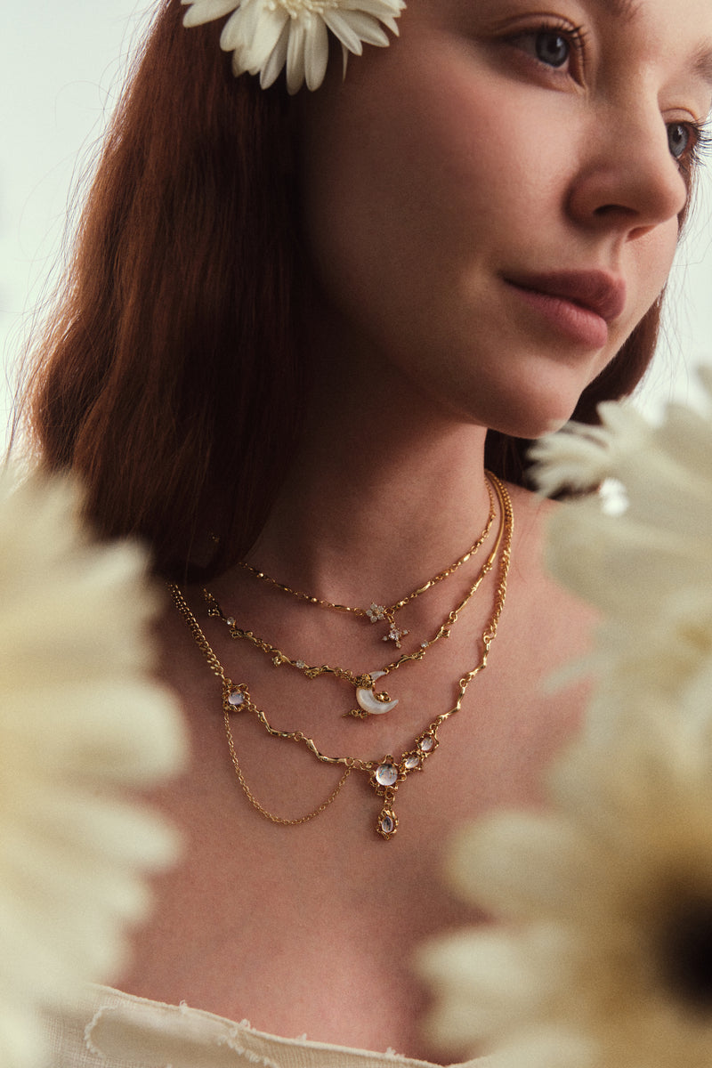 18K gold-plated dangle necklace with glowing zirconia moonstones