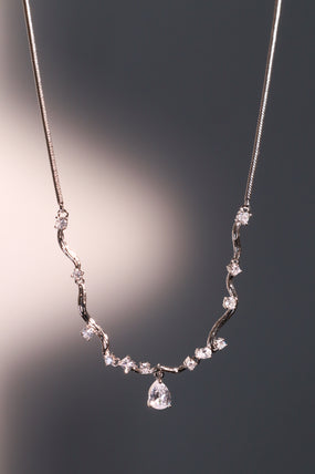 Platinum Plated Diamond Spiral Drop Necklace