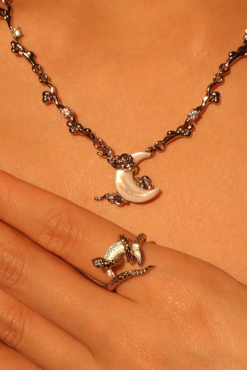 Palladium white gold plated crescent moon necklace with natural white shell pendant and zirconia diamonds