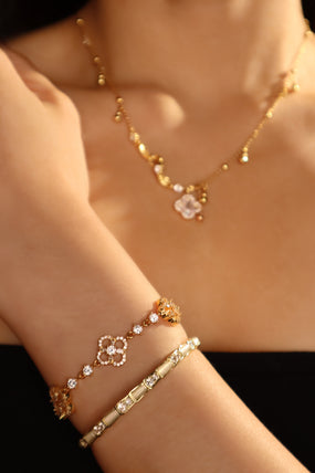 14K gold-plated stretch bracelet with white zirconia opals and zirconia diamonds