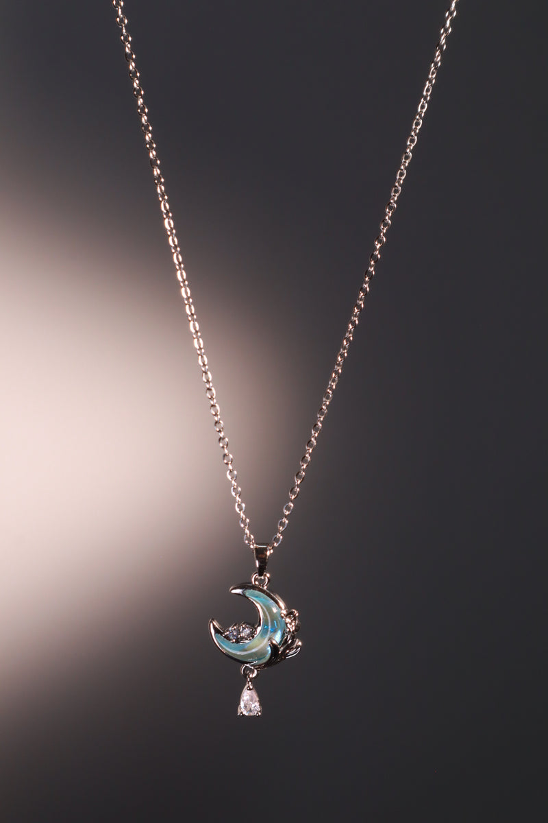 Rose and moon necklace with a blue zirconia moonstone and cut zirconia on a stainless steel chain