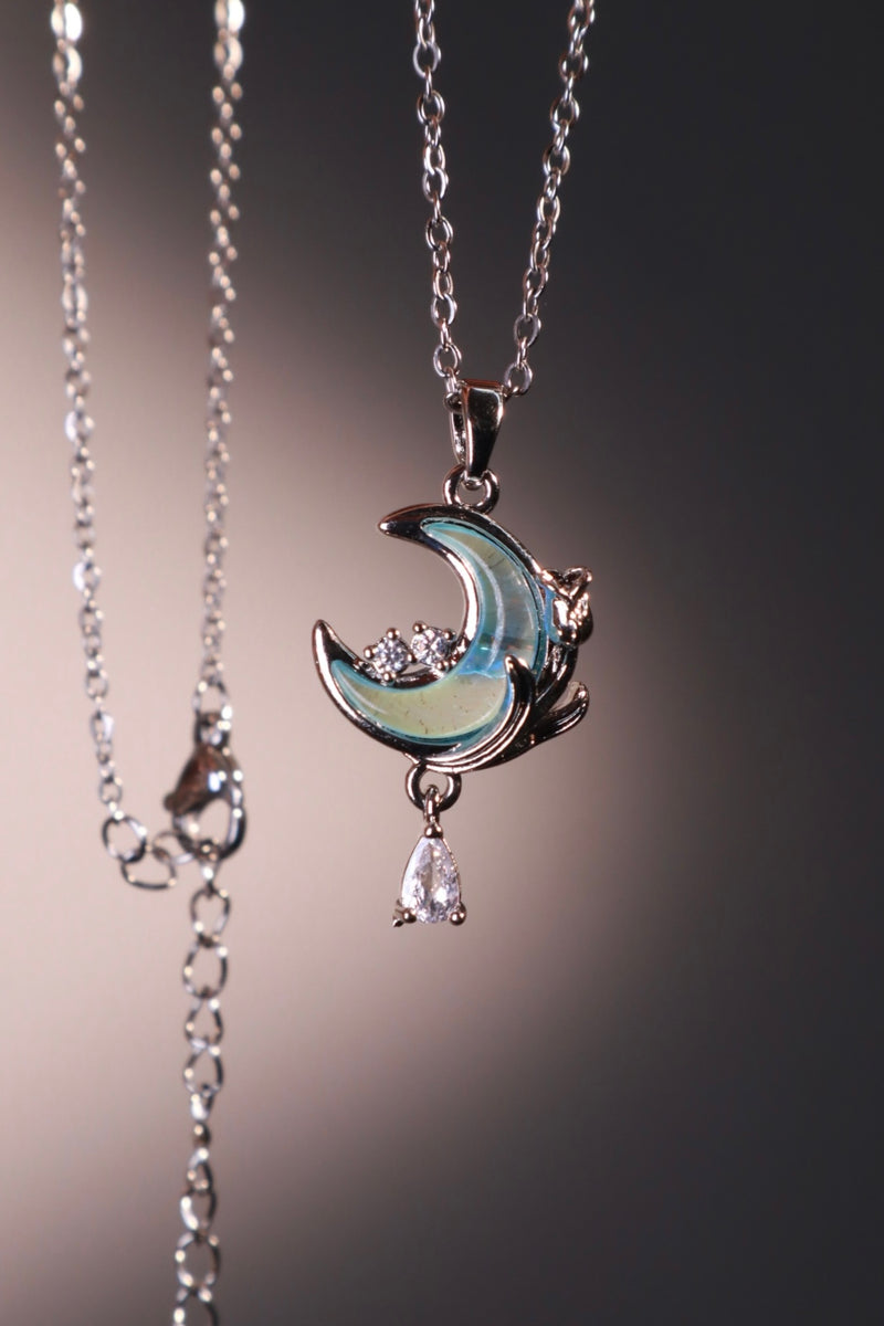 Rose and moon necklace with a blue zirconia moonstone and cut zirconia on a stainless steel chain