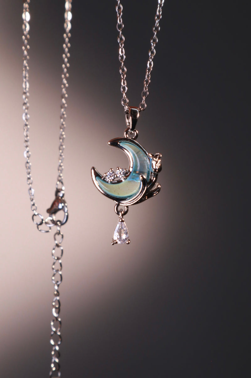 Rose and moon necklace with a blue zirconia moonstone and cut zirconia on a stainless steel chain