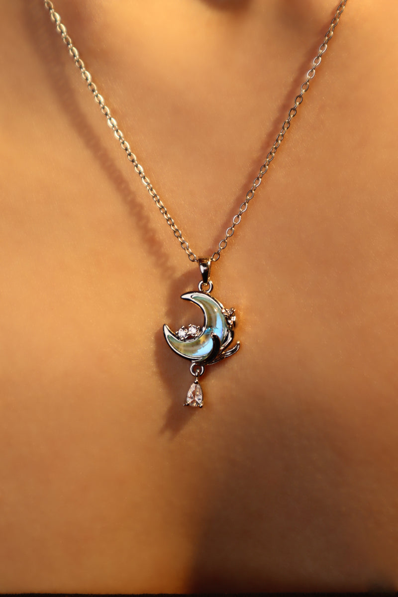 Rose and moon necklace with a blue zirconia moonstone and cut zirconia on a stainless steel chain