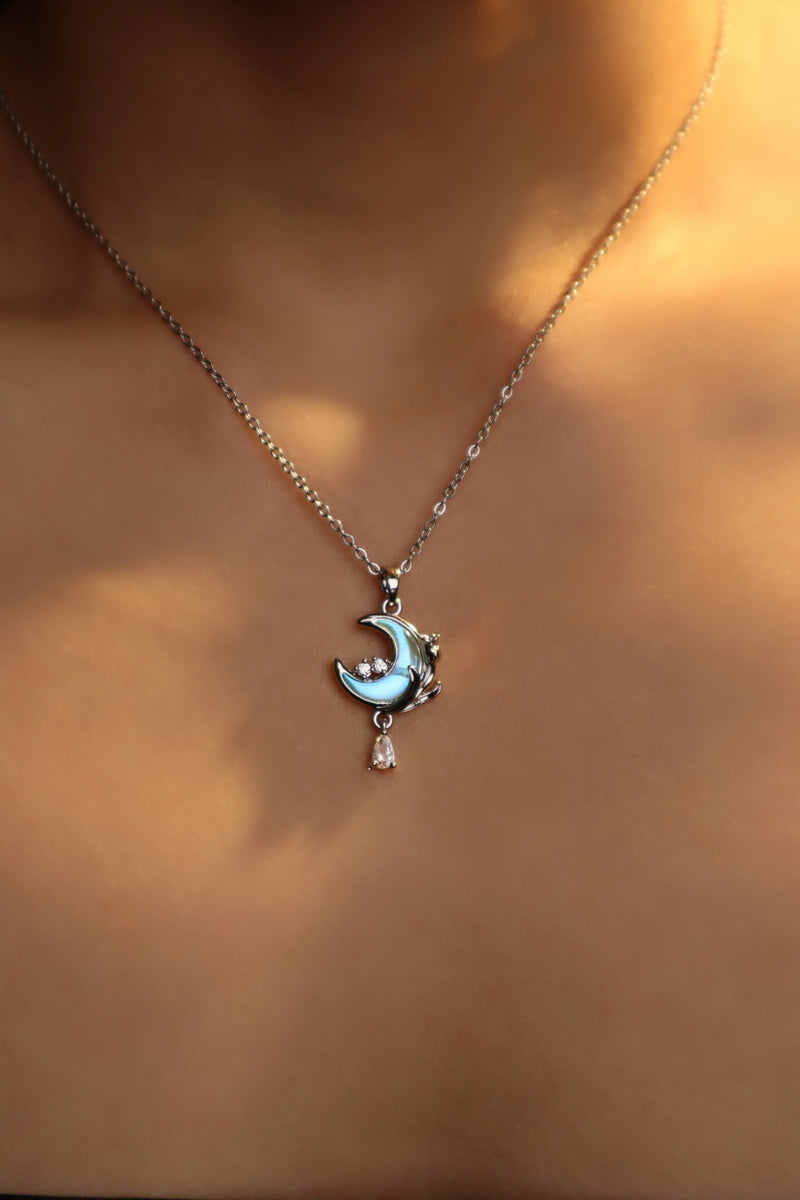 Rose and moon necklace with a blue zirconia moonstone and cut zirconia on a stainless steel chain