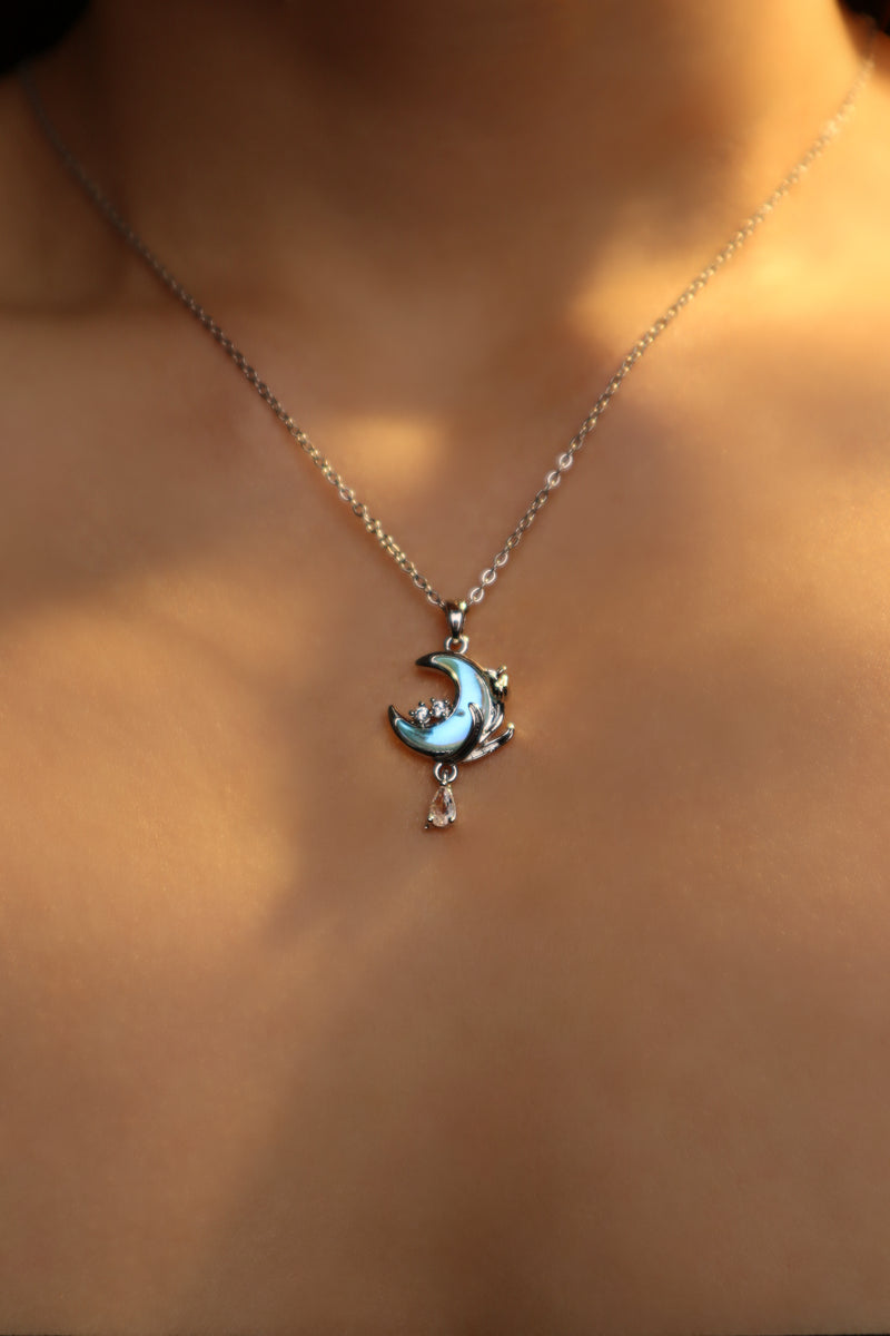 Rose and moon necklace with a blue zirconia moonstone and cut zirconia on a stainless steel chain