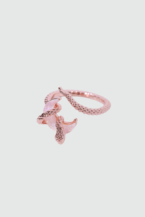 18K rose gold-plated snake ring wrapped around a zirconia moonstone
