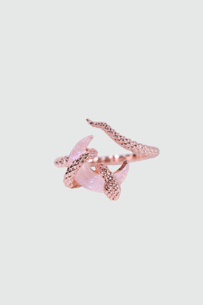 18K rose gold-plated snake ring wrapped around a zirconia moonstone