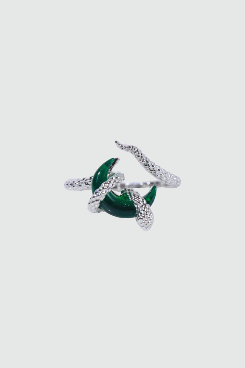 Silver-plated snake ring wrapped around a green zirconia moonstone, adjustable band