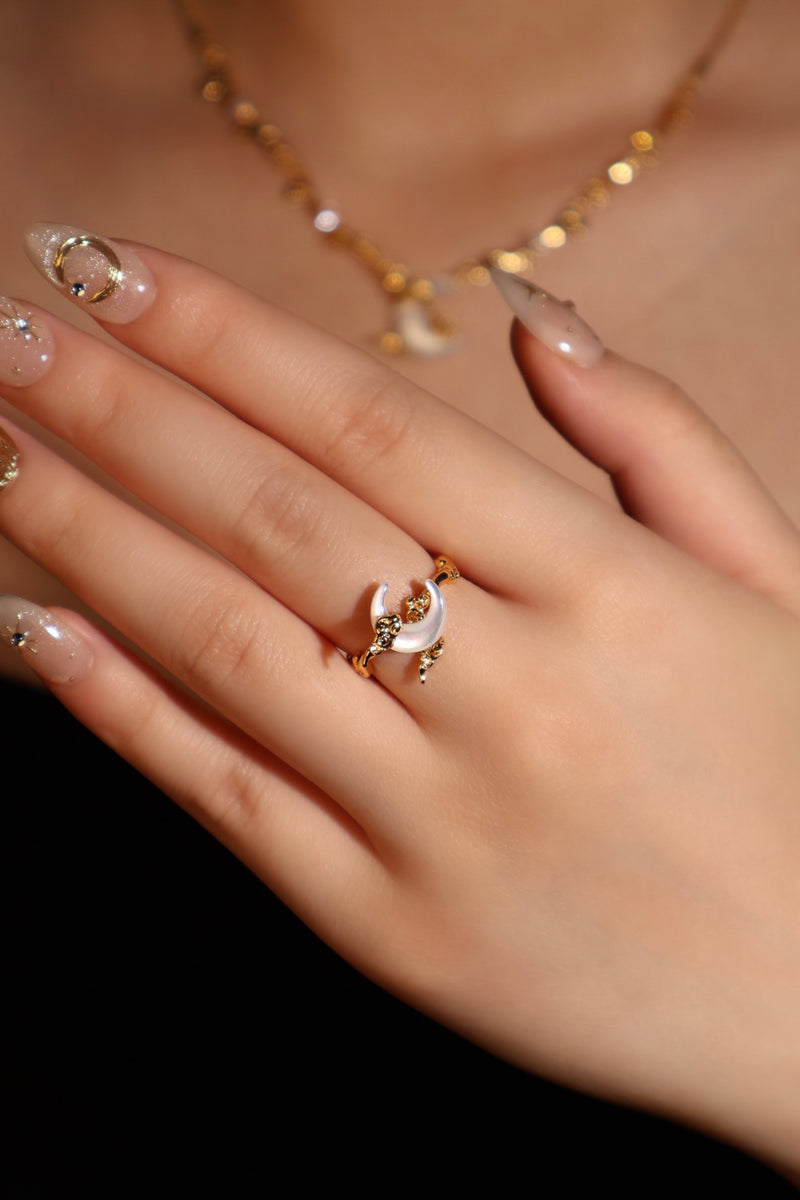 18K gold plated adjustable ring with a white natural shell crescent moon