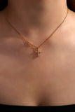 18K gold plated necklace with two zirconia crosses on a single dainty chain