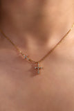 18K gold plated necklace with two zirconia crosses on a single dainty chain