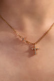 18K gold plated necklace with two zirconia crosses on a single dainty chain