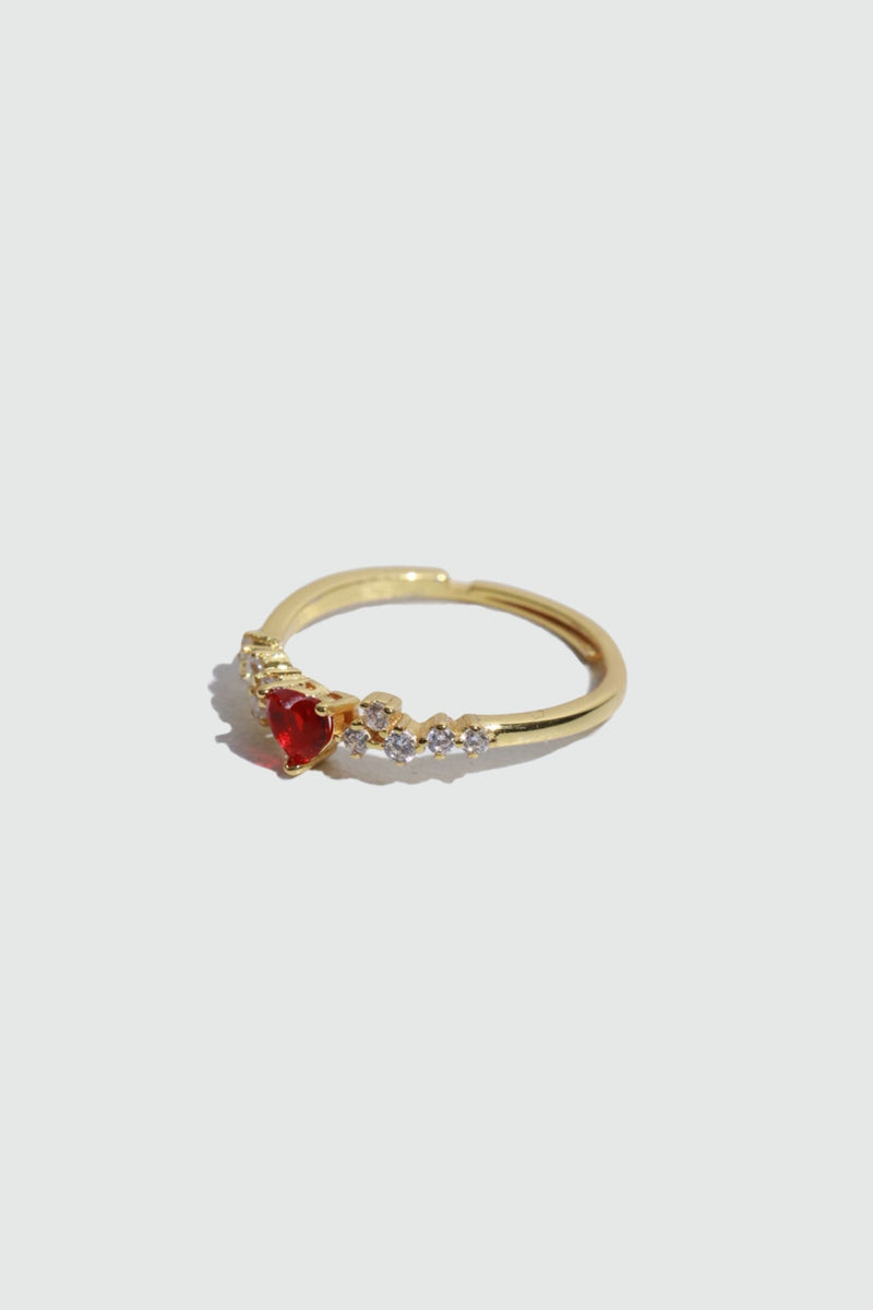 18K gold plated ring with a red crimson heart gemstone and sparkling zirconia on an adjustable band