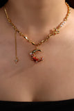 18K gold plated red moon necklace with synthetic pearls and sparkling zirconia