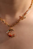 18K gold plated red moon necklace with synthetic pearls and sparkling zirconia