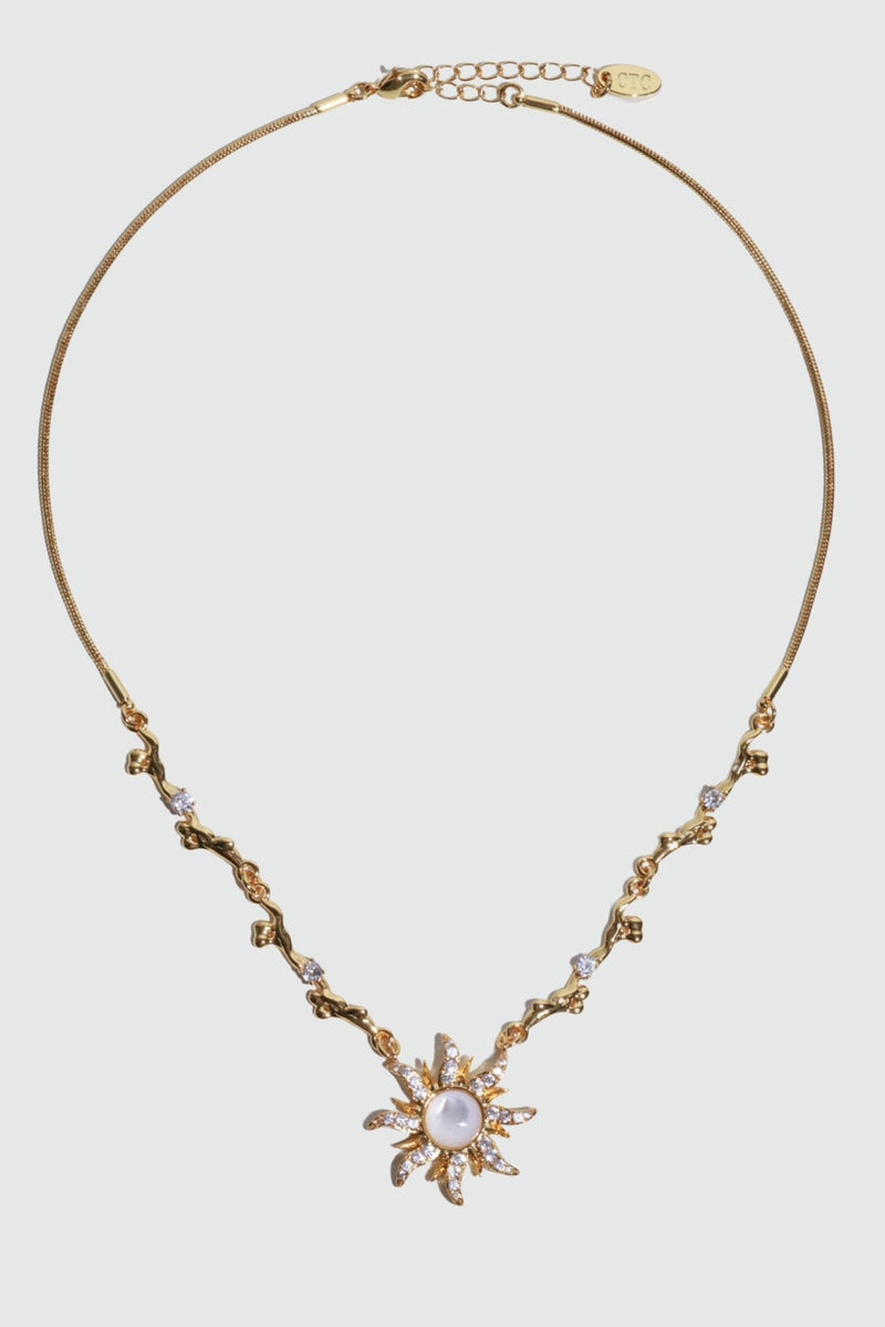 18K gold plated sun necklace with a white natural shell and sparkling zirconia