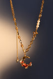 18K gold plated red moon necklace with synthetic pearls and sparkling zirconia