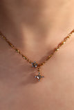 18K gold plated over stainless steel cross necklace with sparkling zirconia diamonds