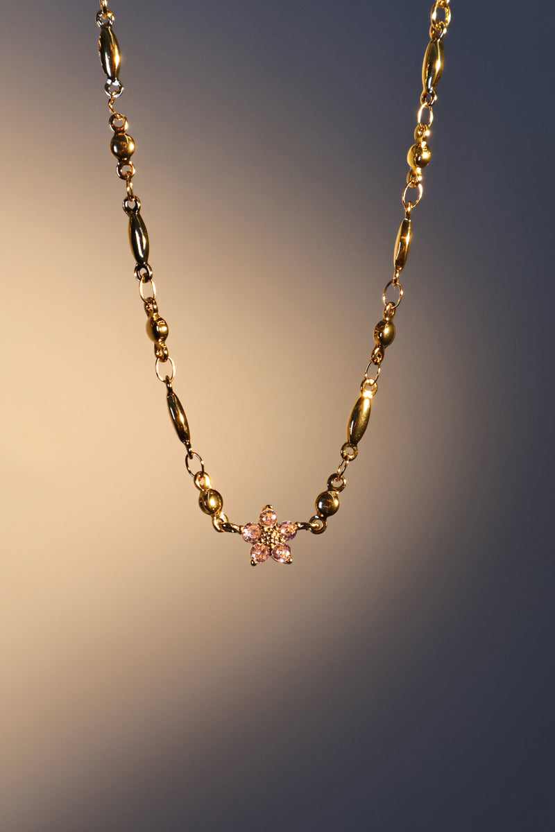 18K gold plated starlight bloom necklace with pink tourmaline zirconia gemstones