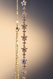 18K gold plated necklace with multiple starlight blooms of sparkling zirconia