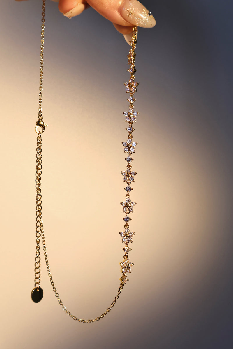 18K gold plated necklace with multiple starlight blooms of sparkling zirconia