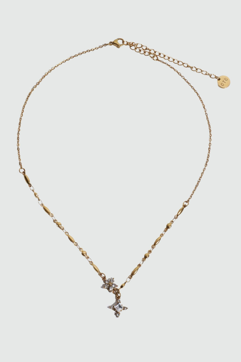 18K gold plated over stainless steel cross necklace with sparkling zirconia diamonds