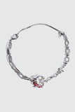 Silver plated bracelet with a glowing red resin crescent moon and sparkling zirconia