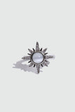 Silver plated sun ring with a glowing white zirconia moonstone and sparkling zirconia on an adjustable band