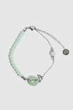 Palladium white gold plated bracelet with a jade ginkgo leaf and sparkling zirconia diamonds