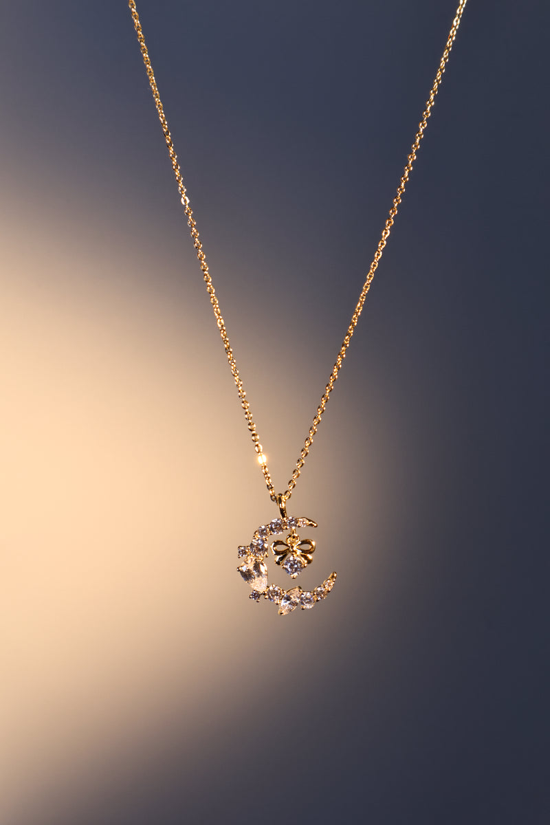 14K gold plated moon and bowknot necklace with sparkling zirconia diamonds