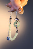 Palladium white gold plated bracelet with a jade ginkgo leaf and sparkling zirconia diamonds