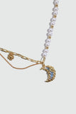 18K gold plated moon necklace with a blue resin moon and synthetic pearls
