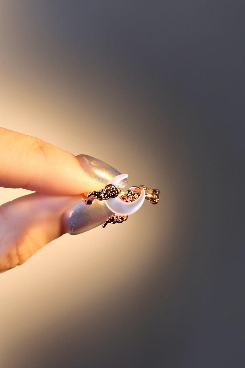 18K rose gold plated ring with a white natural shell moon on an adjustable band