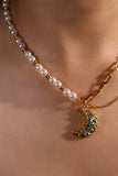 18K gold plated moon necklace with a blue resin moon and synthetic pearls