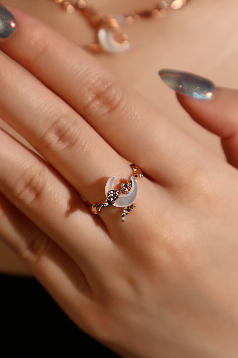 18K rose gold plated ring with a white natural shell moon on an adjustable band