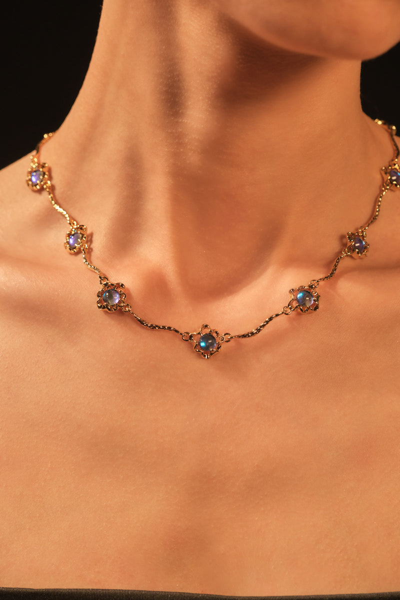18K gold-plated necklace with multiple deep blue zirconia moonstones on a delicate chain