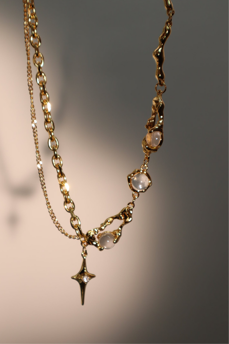 18K gold-plated moonlight star necklace with glowing zirconia moon gems