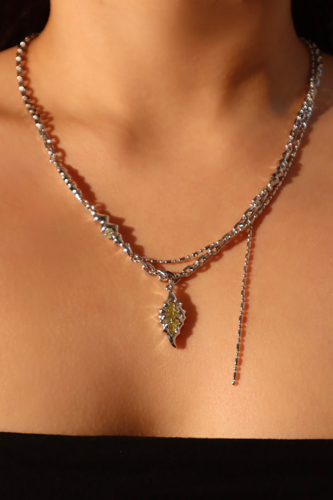 Platinum Plated Green Gem Feather Necklace