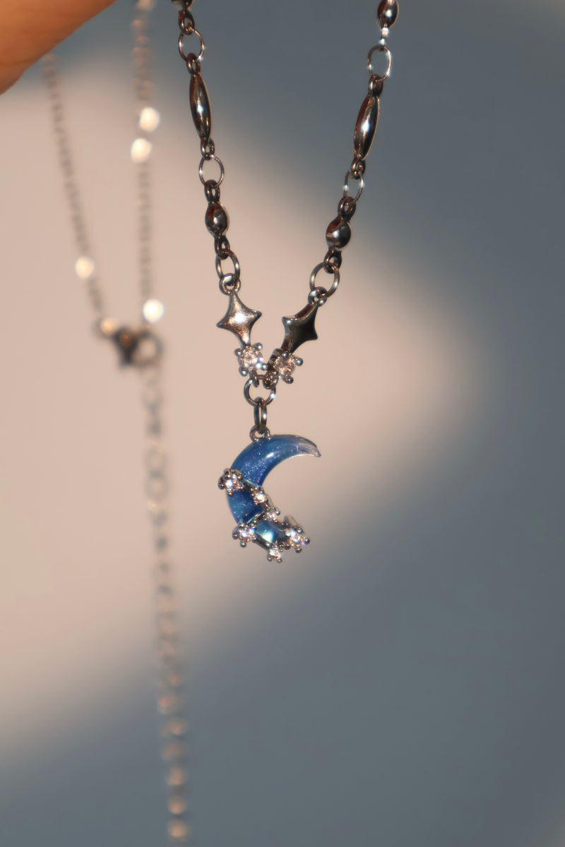 Palladium white-gold-plated moon and star necklace with a zirconia moonstone and zirconia diamonds