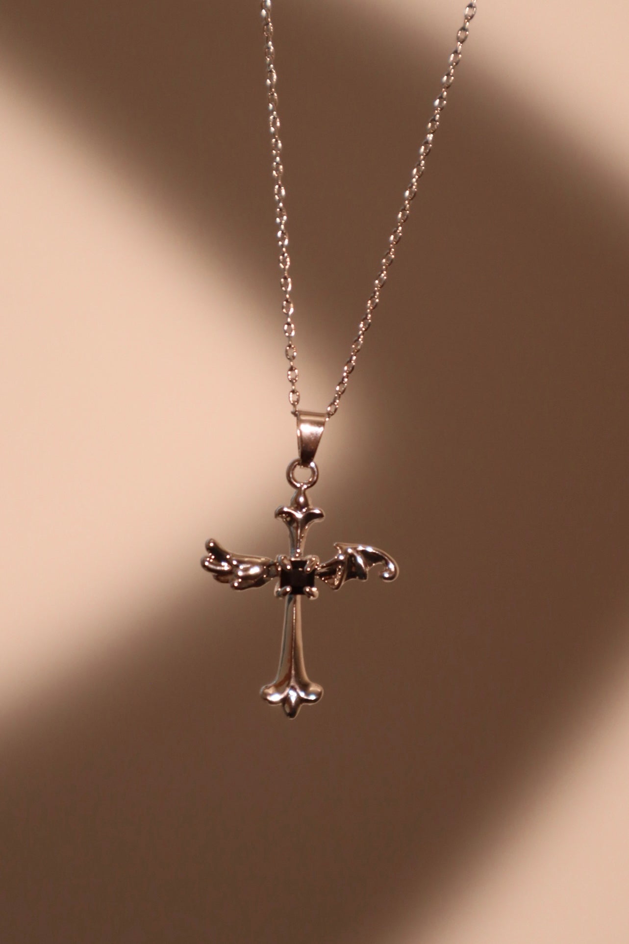 Platinum Plated Black Gem Angel Cross Necklace