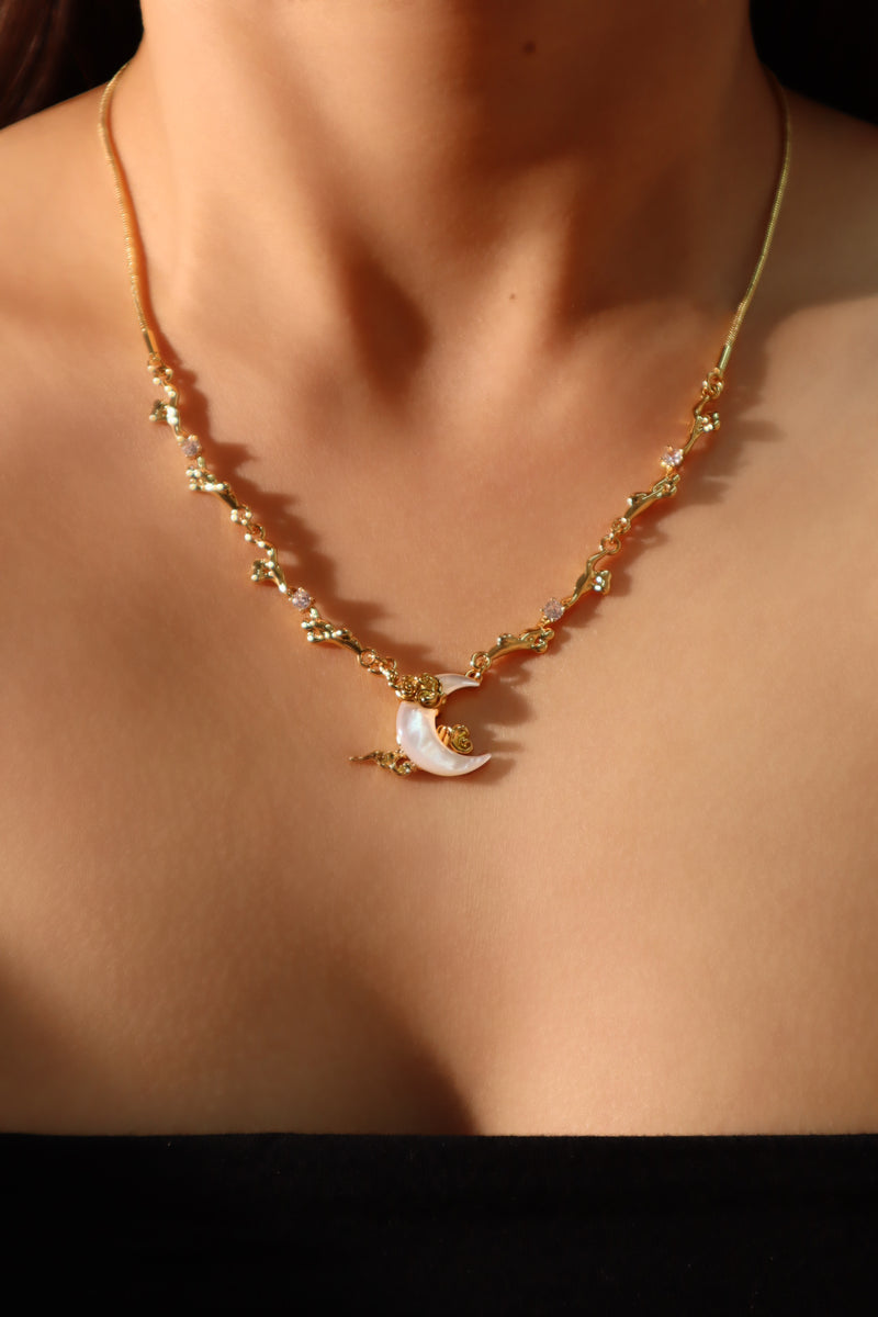 18K gold-plated crescent moon necklace with natural white shell pendant and zirconia diamonds