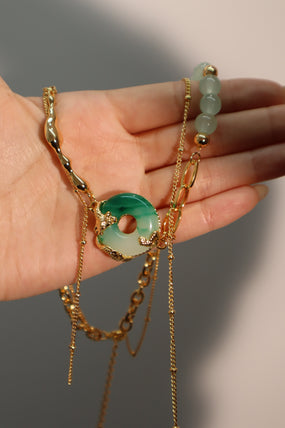 Gold-plated jade dragon chain necklace with green and white handmade jade beads