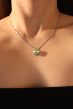 Platinum Plated Spinning Jade Clover Necklace