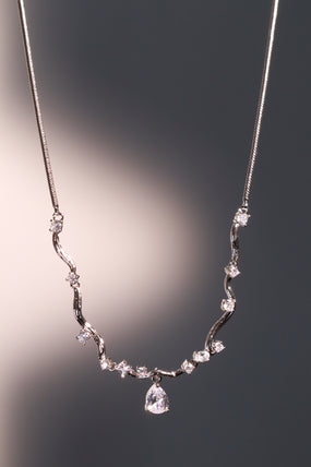 Platinum Plated Diamond Spiral Drop Necklace