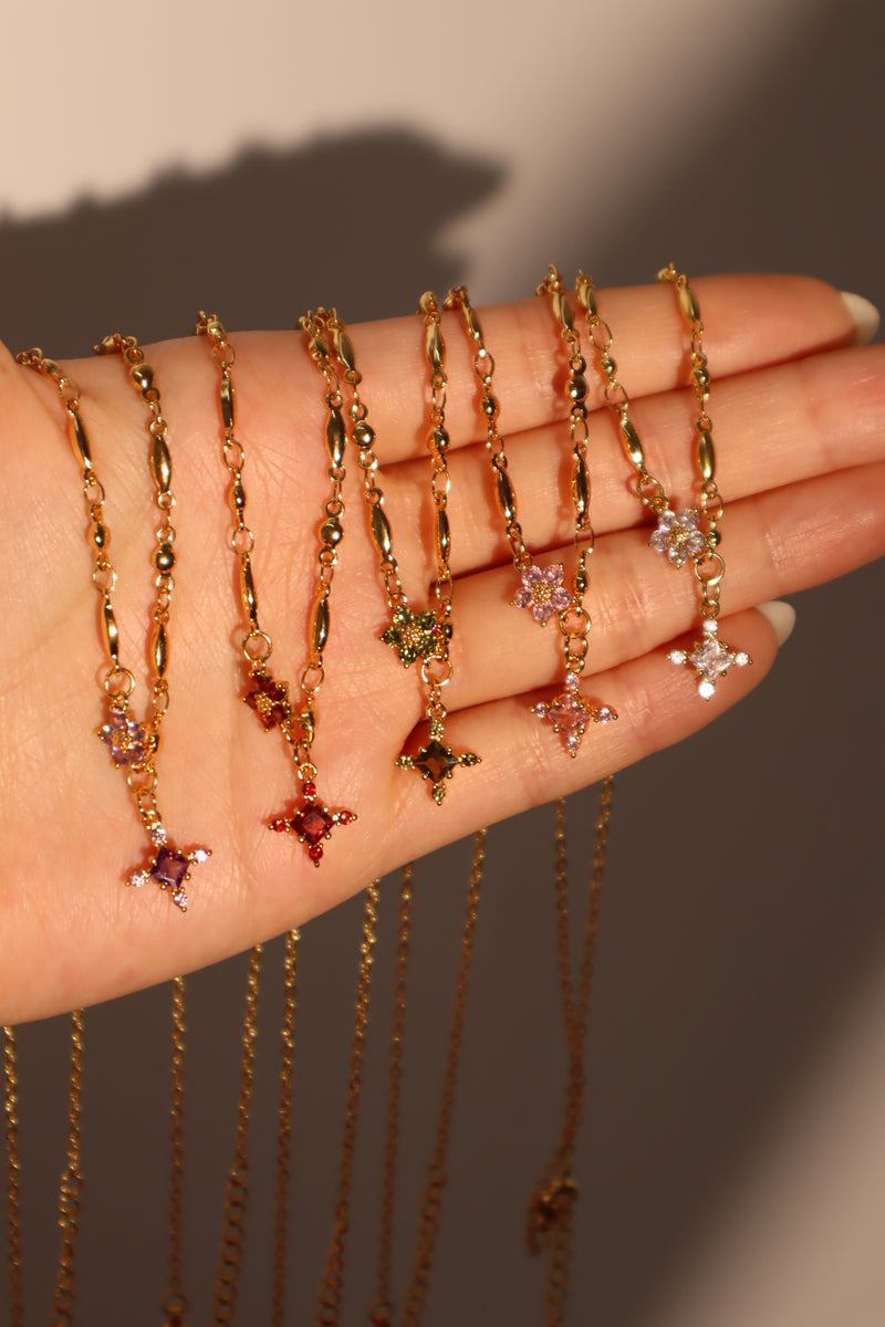 18K gold-plated cross necklace set with pink zirconia gemstones