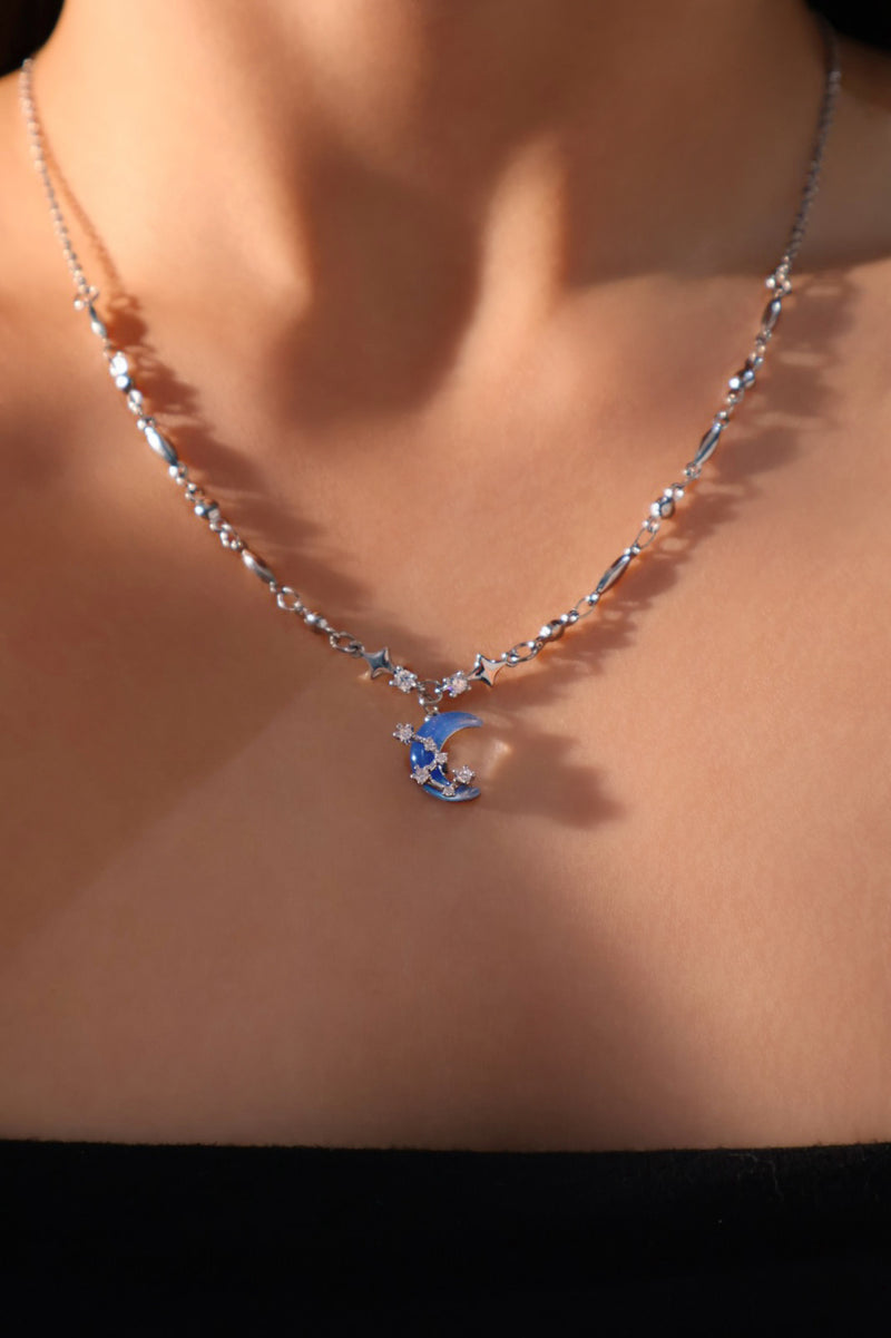 Palladium white-gold-plated moon and star necklace with a zirconia moonstone and zirconia diamonds