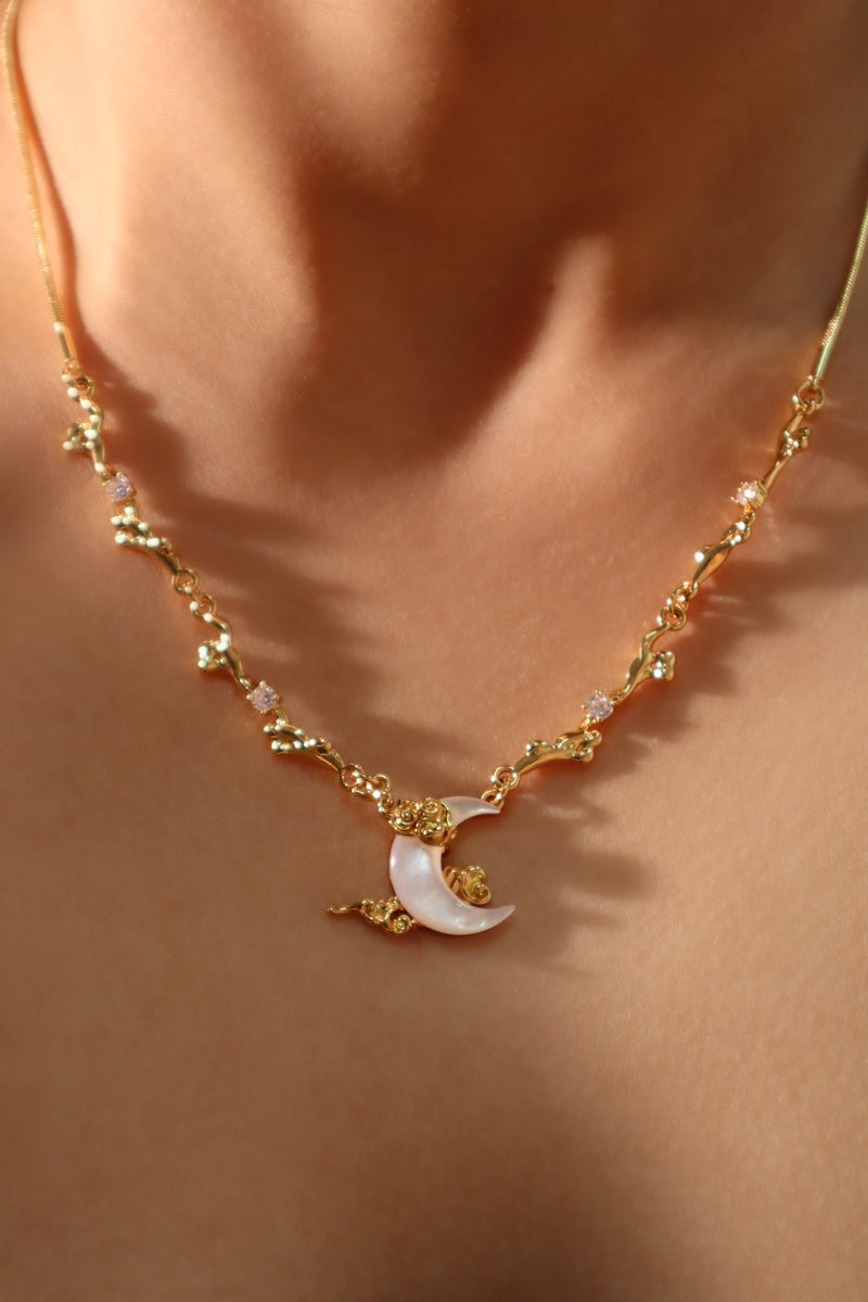 18K gold-plated crescent moon necklace with natural white shell pendant and zirconia diamonds